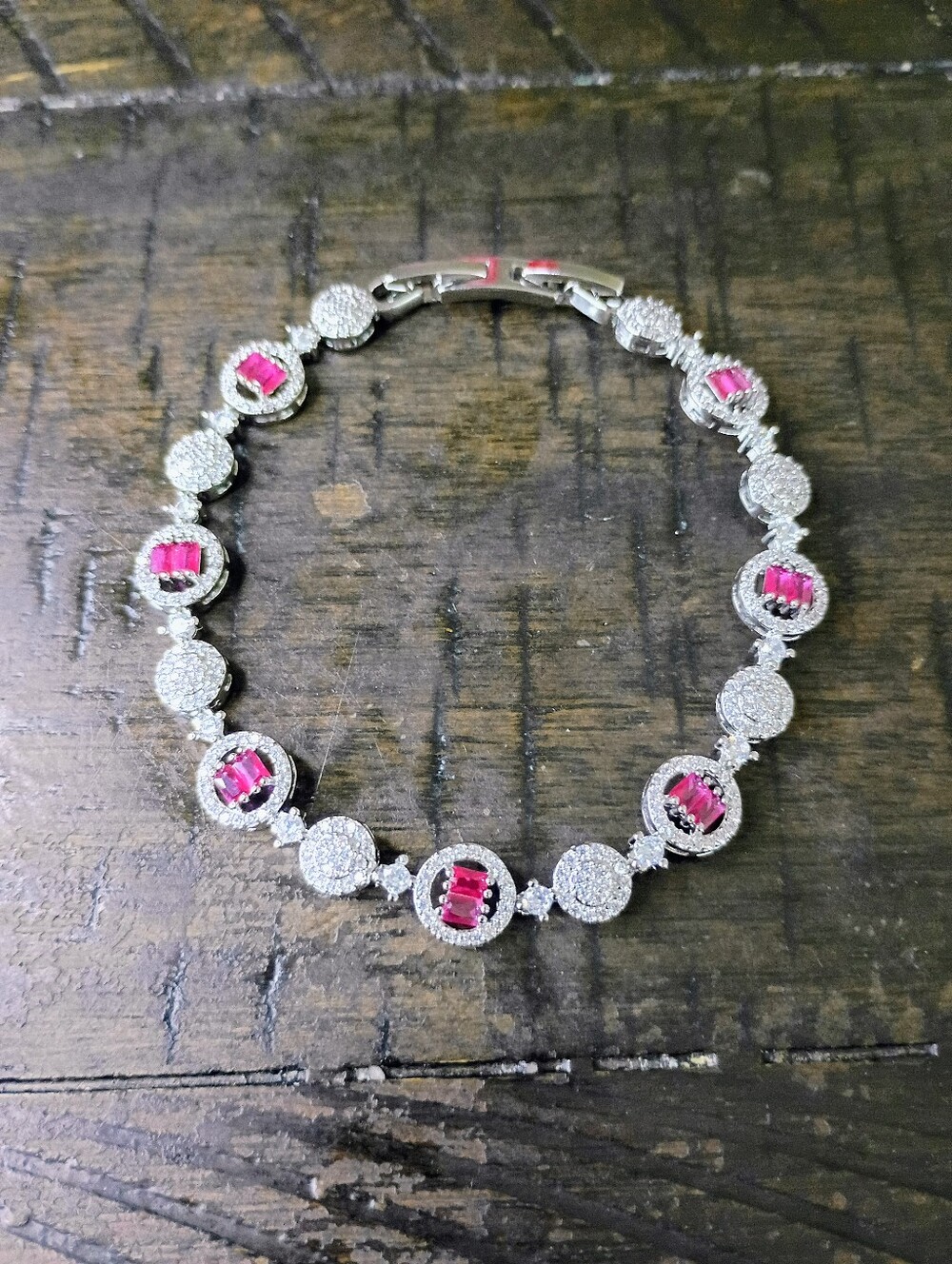 New White Gold Plated Tennis Bracelet with Pink Gem Accents